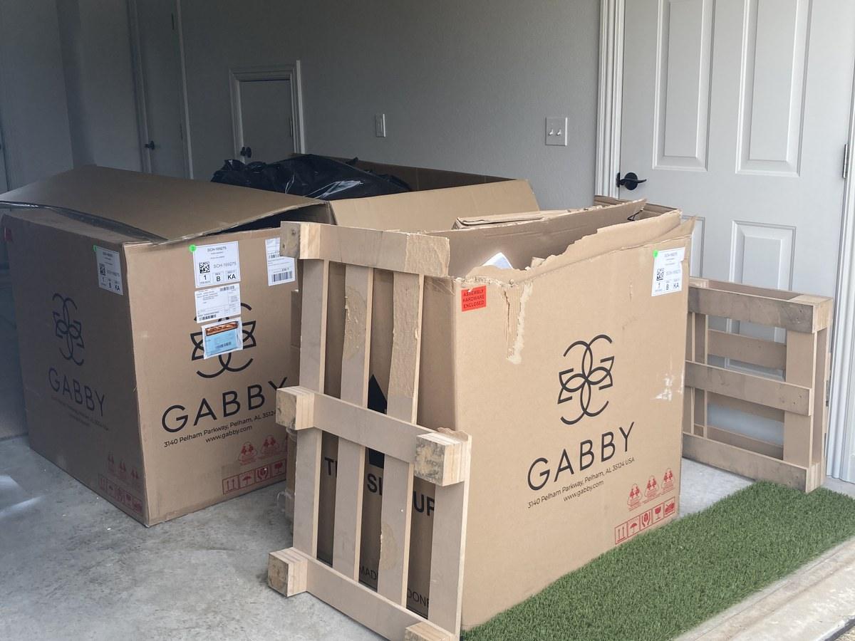Garage pile of boxes and crates ready for weekend junk removal